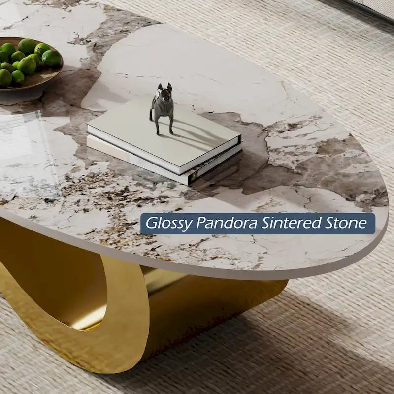 Table basse ovale Gold & Stone avec plateau en pierre frittée et base en acier inoxydable doré - Usage unique