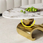 Table basse ovale Gold & Stone avec plateau en pierre frittée et base en acier inoxydable doré - Usage unique