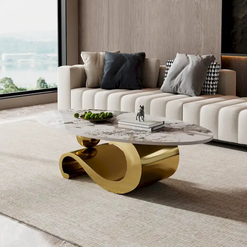 Table basse ovale Gold & Stone avec plateau en pierre frittée et base en acier inoxydable doré - Usage unique