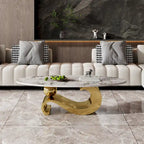 Table basse ovale Gold & Stone avec plateau en pierre frittée et base en acier inoxydable doré - Usage unique