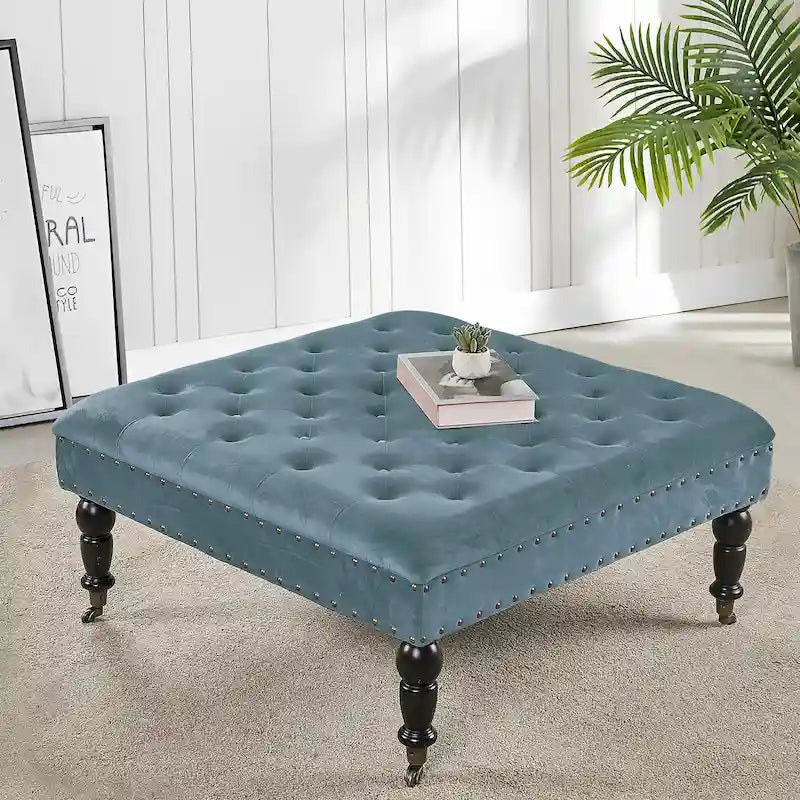 Pouf carré capitonné de couleur sarcelle foncée / vert agate / bleu orion / carafe / argent / tourbe / ivoire / orange brûlé / taupe avec roulettes en laiton – Usage unique