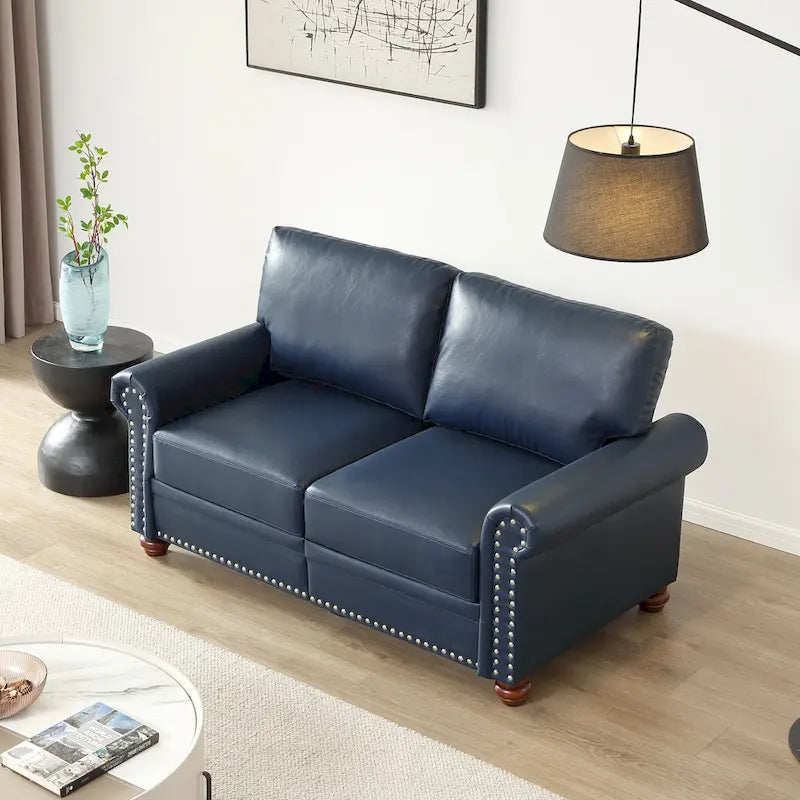 Causeuse en similicuir bleu marine avec clous décoratifs argentés et rangement sous l'assise - 2 places