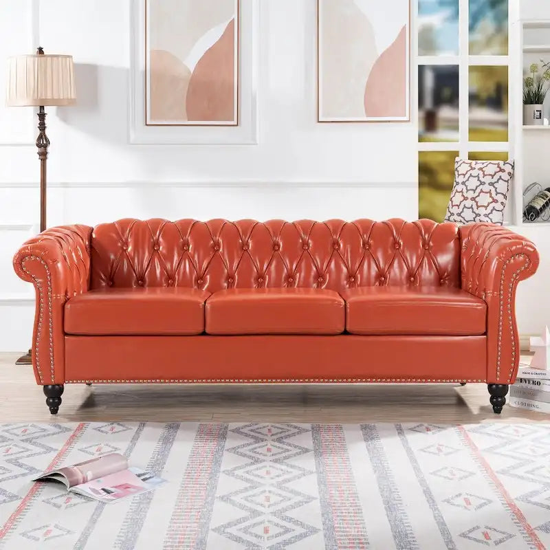 Canapé Chesterfield 3 places en similicuir noir/marron/blanc/orange avec accoudoirs roulés, capitonnage et clous décoratifs