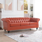Canapé Chesterfield 3 places en similicuir noir/marron/blanc/orange avec accoudoirs roulés, capitonnage et clous décoratifs