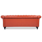 Canapé Chesterfield 3 places en similicuir noir/marron/blanc/orange avec accoudoirs roulés, capitonnage et clous décoratifs