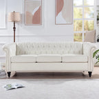 Canapé Chesterfield 3 places en similicuir noir/marron/blanc/orange avec accoudoirs roulés, capitonnage et clous décoratifs