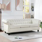 Canapé Chesterfield 3 places en similicuir noir/marron/blanc/orange avec accoudoirs roulés, capitonnage et clous décoratifs