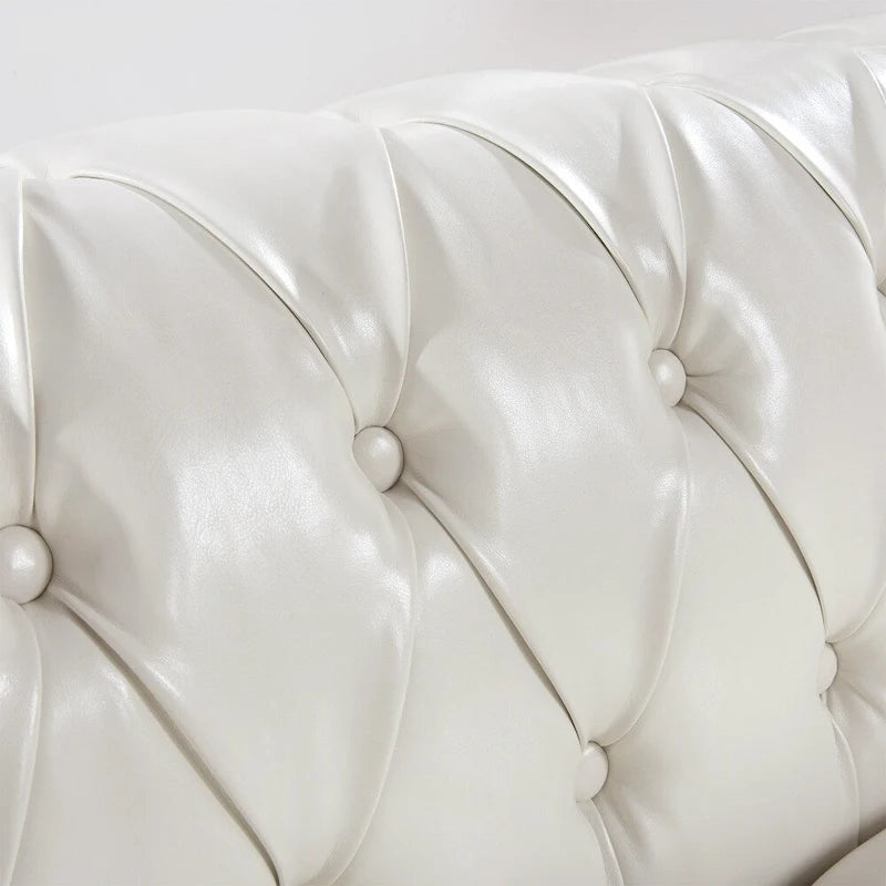 Canapé Chesterfield 3 places en similicuir noir/marron/blanc/orange avec accoudoirs roulés, capitonnage et clous décoratifs